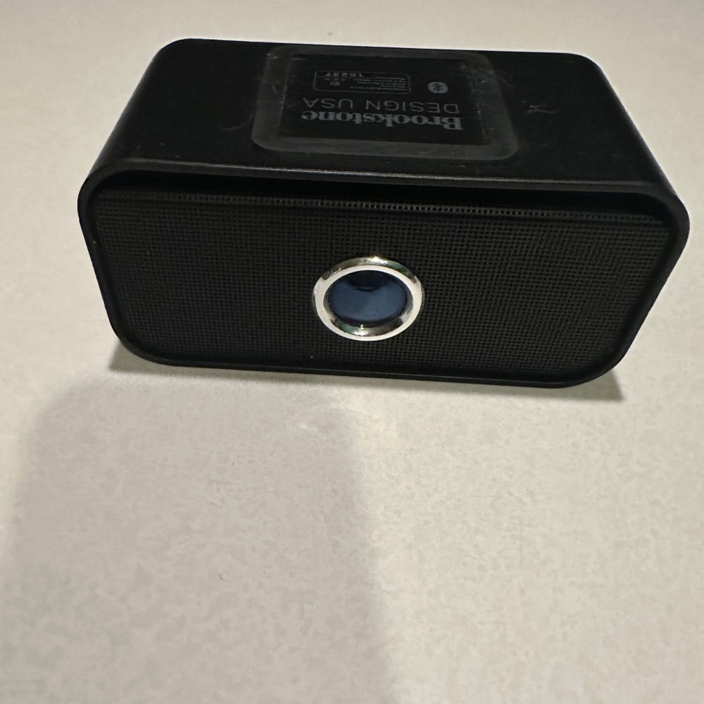 Brookstone Black Portable Mini Speaker with Blue Accent